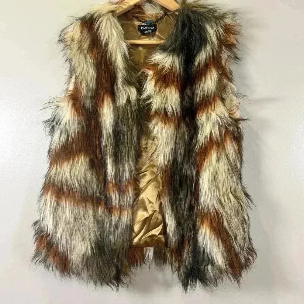 Bebe multi colored women’s faux fur vest, in size S/P